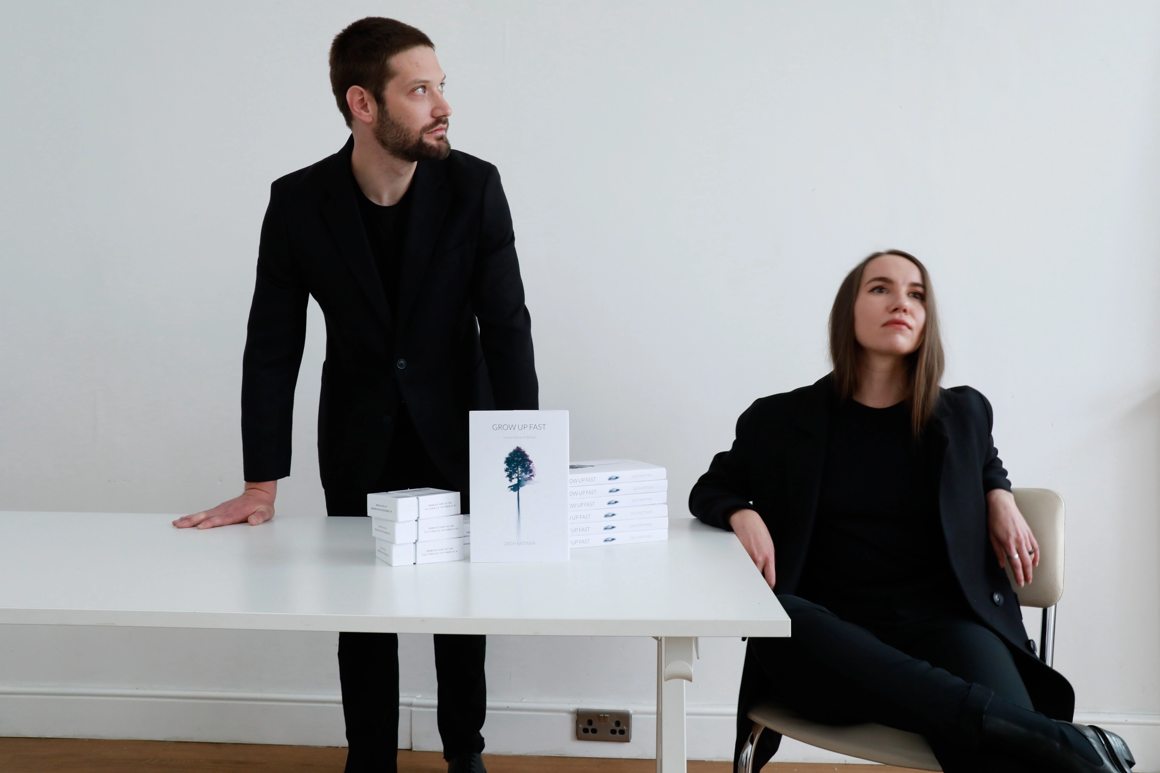 Colleagues discussing ideas around a table