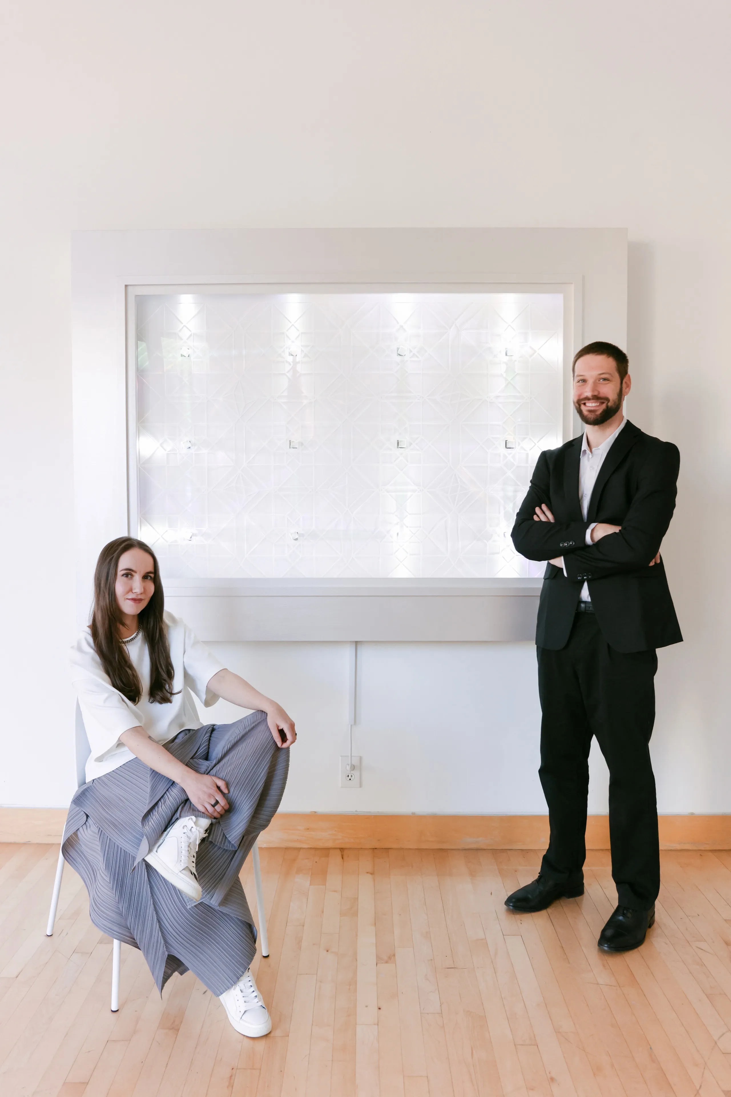 Zach Rattner and Rita Sus sitting next to Lightwall